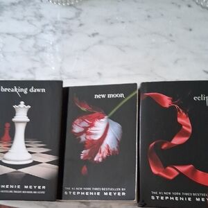 Twilight Saga Books.  Includes Breaking Dawn, New Moon and Eclipse 3 For  $20